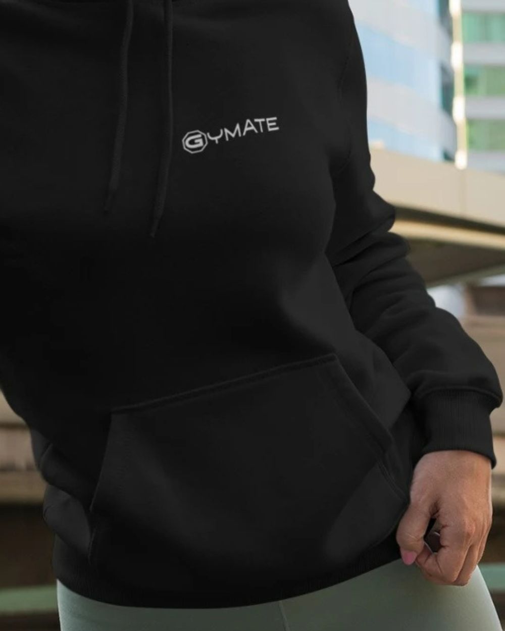 black womens designer hoodie with gymate with close up of logo on chest