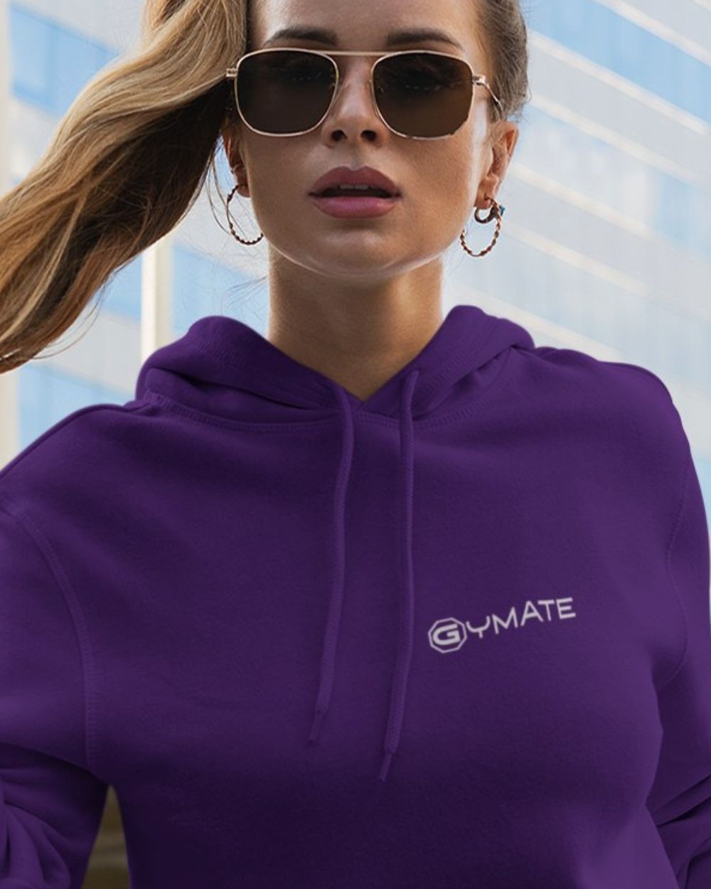 purple womens designer hoodie with close up of gymate logo on chest