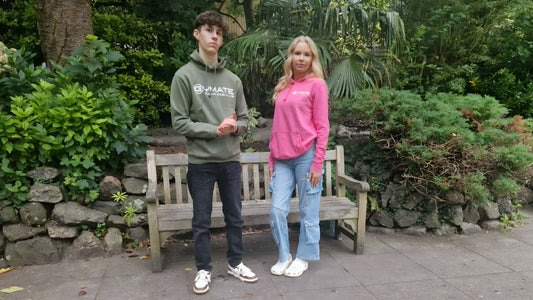 man and woman wearing gymate hoodie showing style and comfort from the essential hoodies range