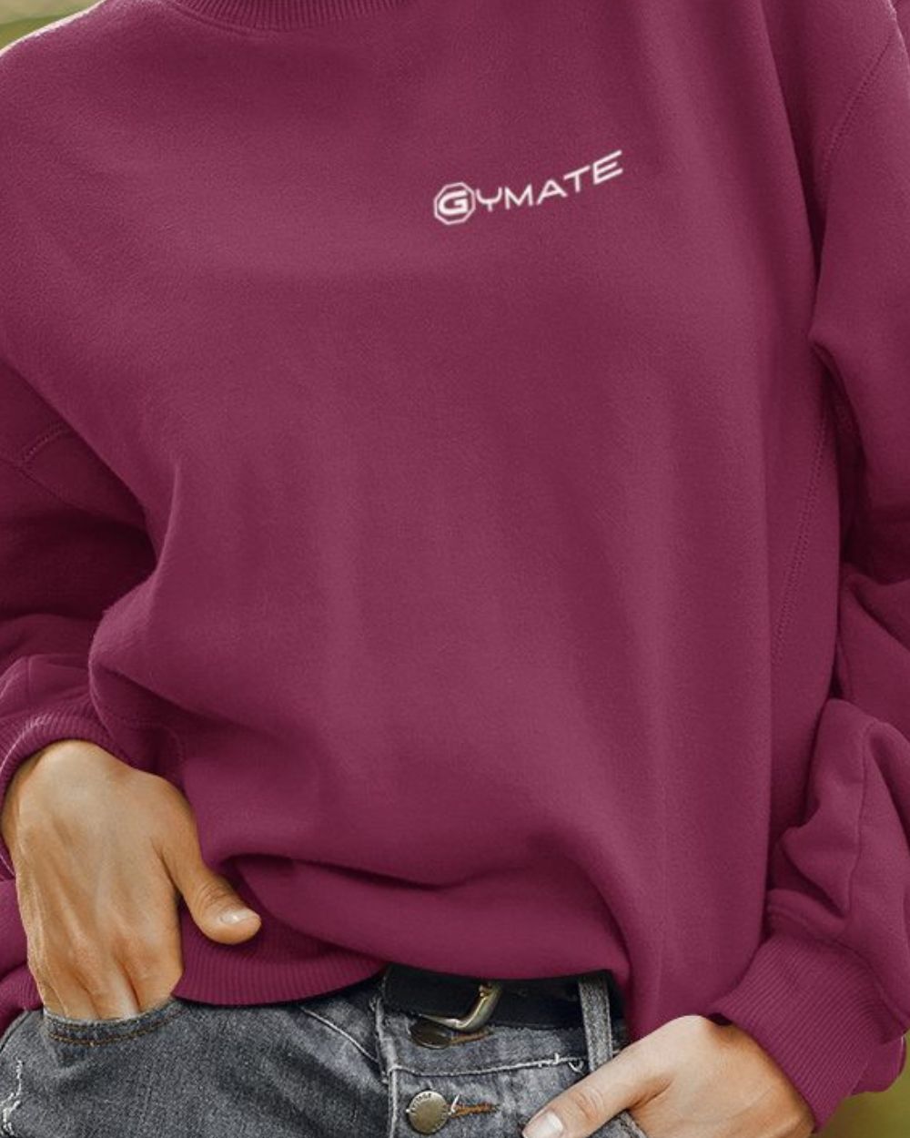 burgandy womens design sweatshirt close up showing logo cuffs and hem