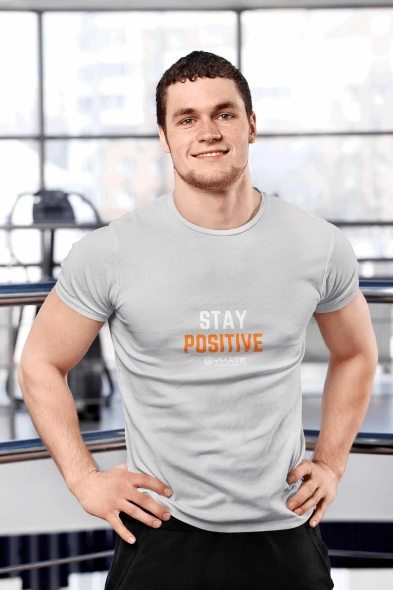 Slogan T Shirts to inspire and uplift Men | Stay Positive light grey
